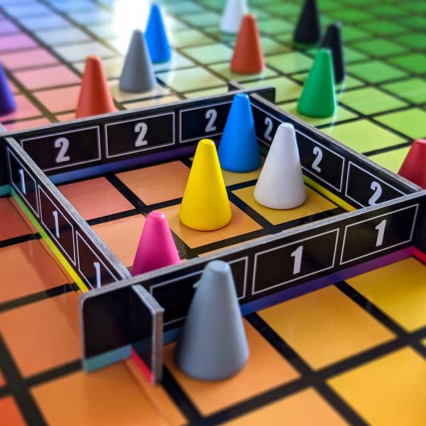 Hues and Cues scoring frame and colorful pawns in gameplay