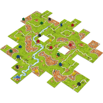 Carcassonne game in progress with tiles and meeples